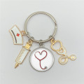 New fashion creative nurse medical syringe stethoscope image keychain glass cabochon and glass dome key ring pendant gift