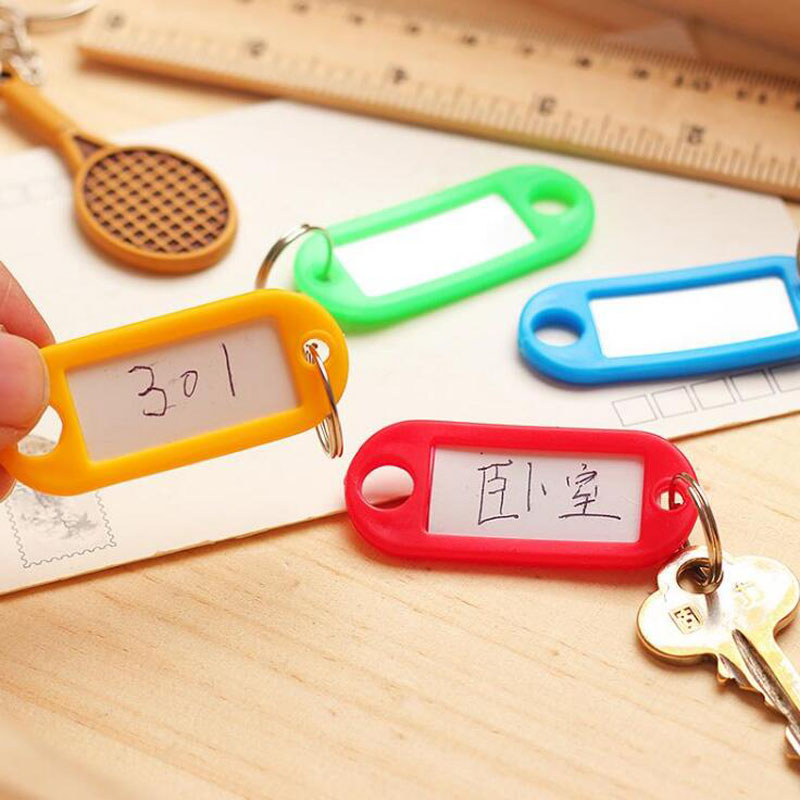 High quality 50Pcs/Lot Mix Color Plastic Keychain Key Tags ID Label Name Tags With Split Ring For Baggage Key Chains Key Rings