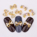 10PCS/bag Nail Decoration 3D Hollow Bow Tie Shape Shiny Manicure Charm Alloy Nails Charms For Manicure Decoration QB040-042