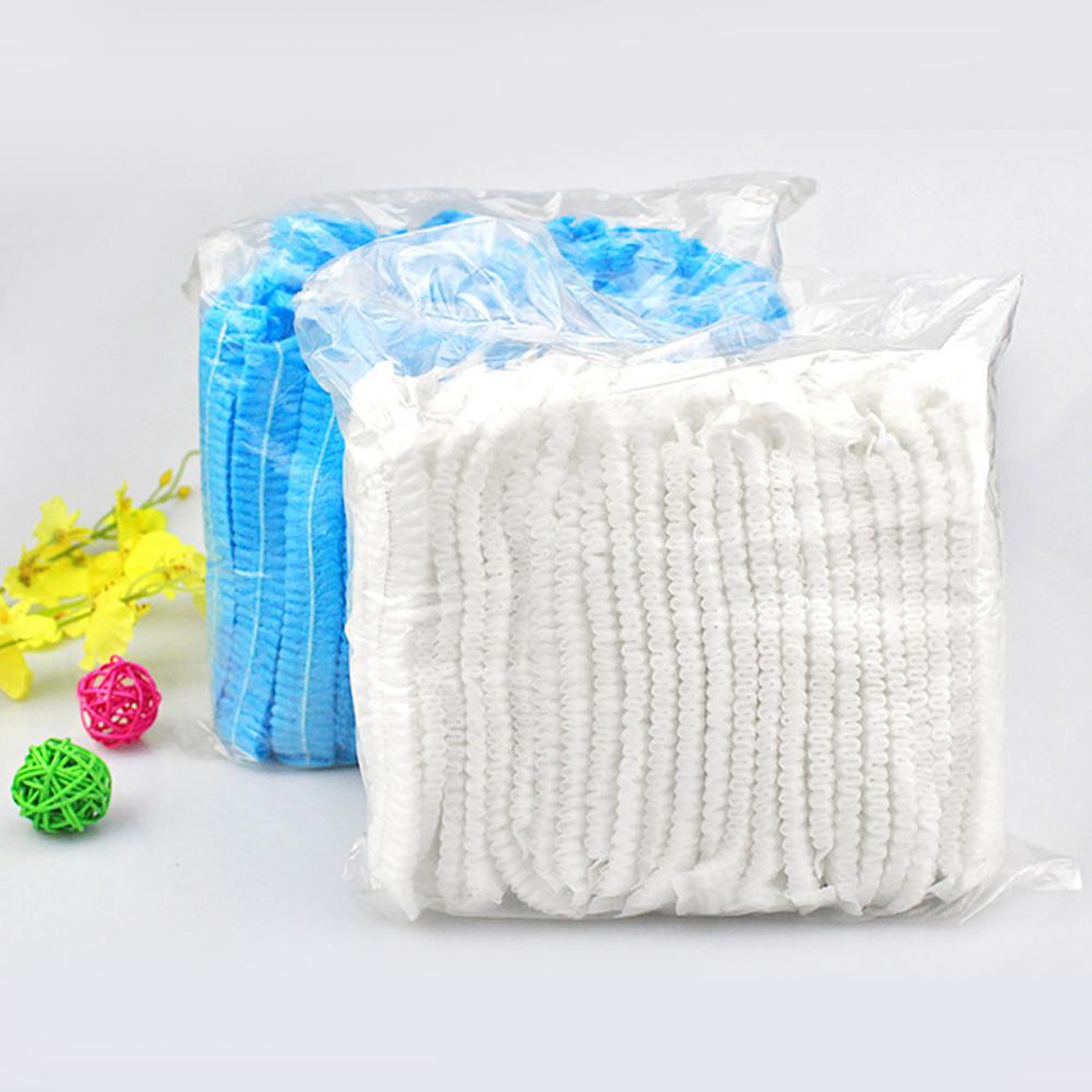 50/100pcs Non-Woven disposable shower Caps Bath Hat Women Men Anti Dust Spa Hair Salon shower cap Beauty Accessories