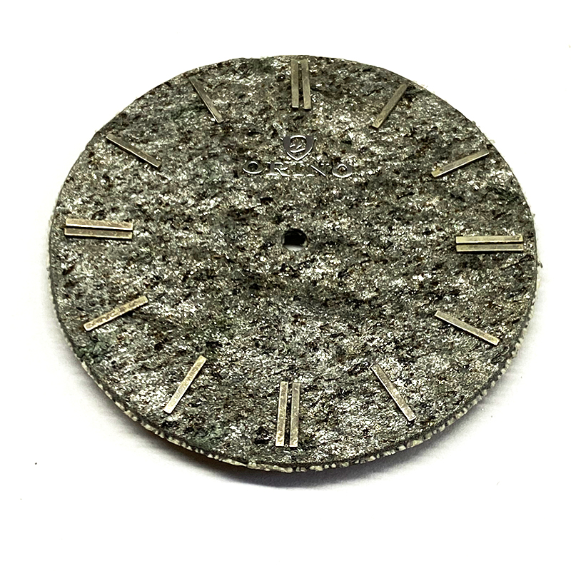 Grey stone watch dial