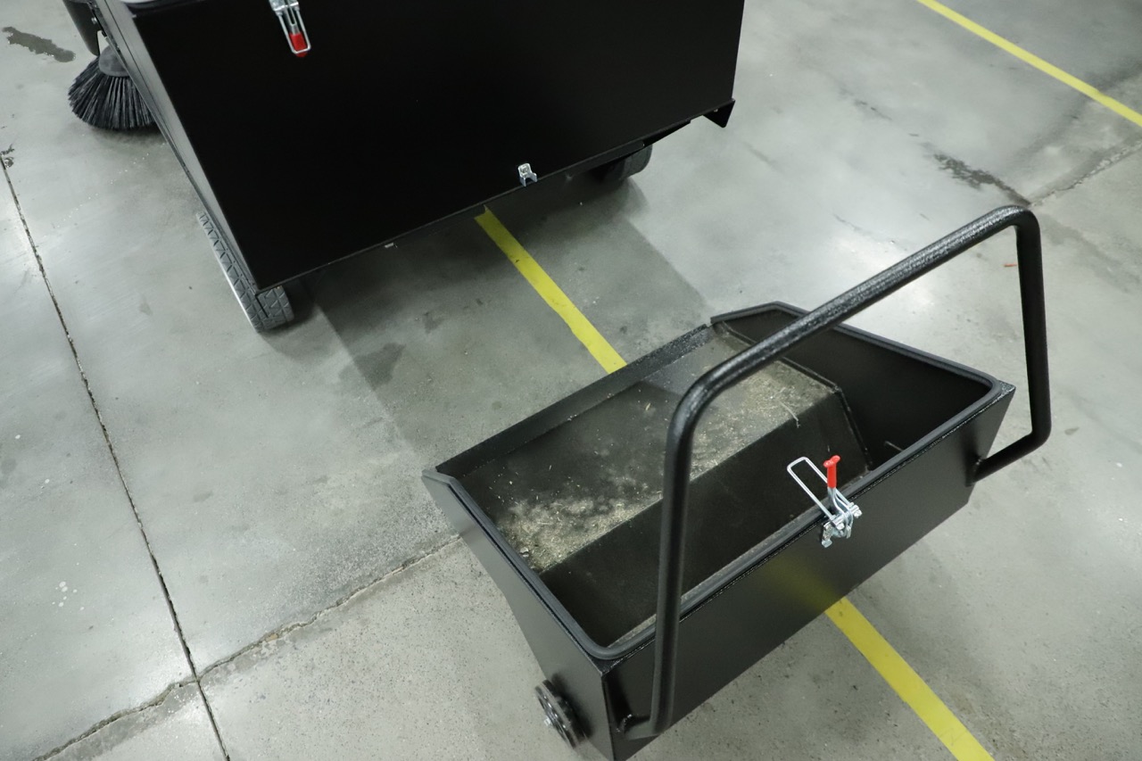 Ride-on floor sweeper