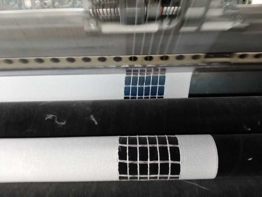 raschel machine for warp knitting