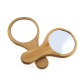 https://www.bossgoo.com/product-detail/portable-wood-makeup-mirror-handheld-mirror-57117524.html