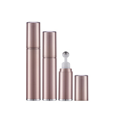 Gold color 5ml 10ml 15ml cosmetic airless roll on eye serum cream empty bottle with roller ball