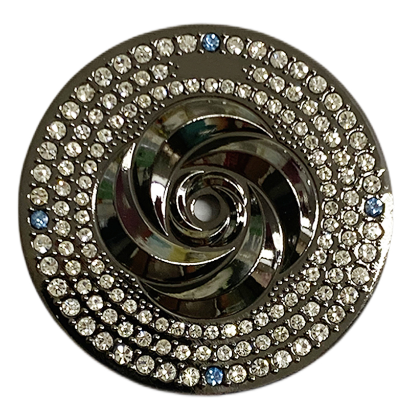 Stones glued in circle on watch dial  