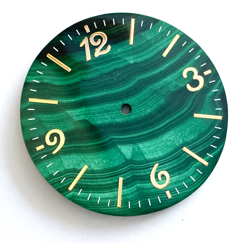 watch dial with malachite gem stone with sticker