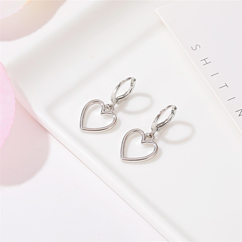 Simple hollow love earrings small fresh wild metal peach heart earrings