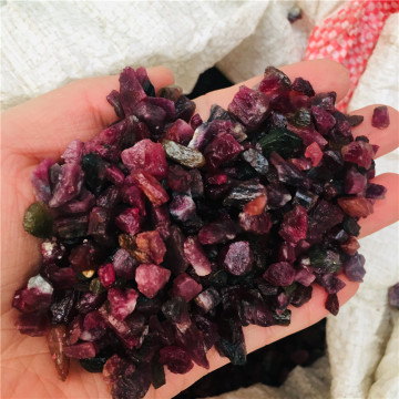 Natural crystal rose garnet raw stone decorations small particles through the body mineral wool stone landscape