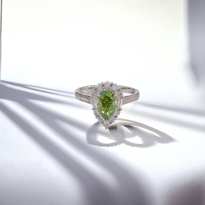 Fancy Vivid Green pear lab diamond ring with round halo and vertical baguette accents