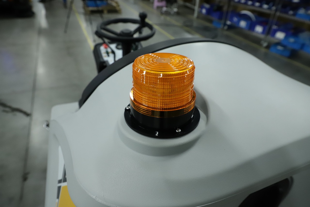 Ride-on floor sweeper
