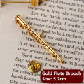 Gold Flute Brooch