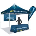 Trade Show Tent With Flags And Table Cloth