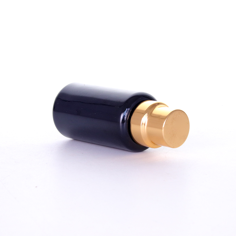 Black Round Glass Bottle With Golden Screw Caps1 Jpg