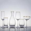 Ribbed design glass drinking set with gold rim