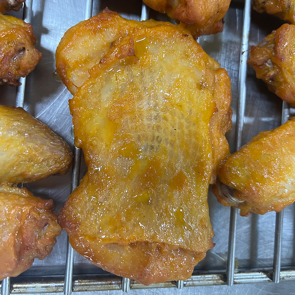 Orleans Grilled Skin-on Chicken Thigh Cutlet‌ Grill Close-up shot