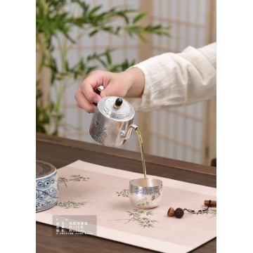 Handcrafted Orchid Silver Teapot for Refined Moments