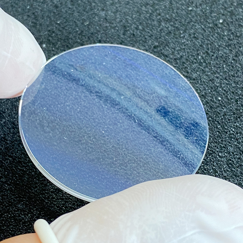 GLASS WITH  BLUE COATING 