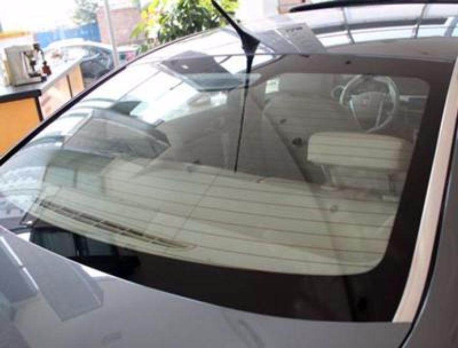 Defogging lines of automobile rear window glass