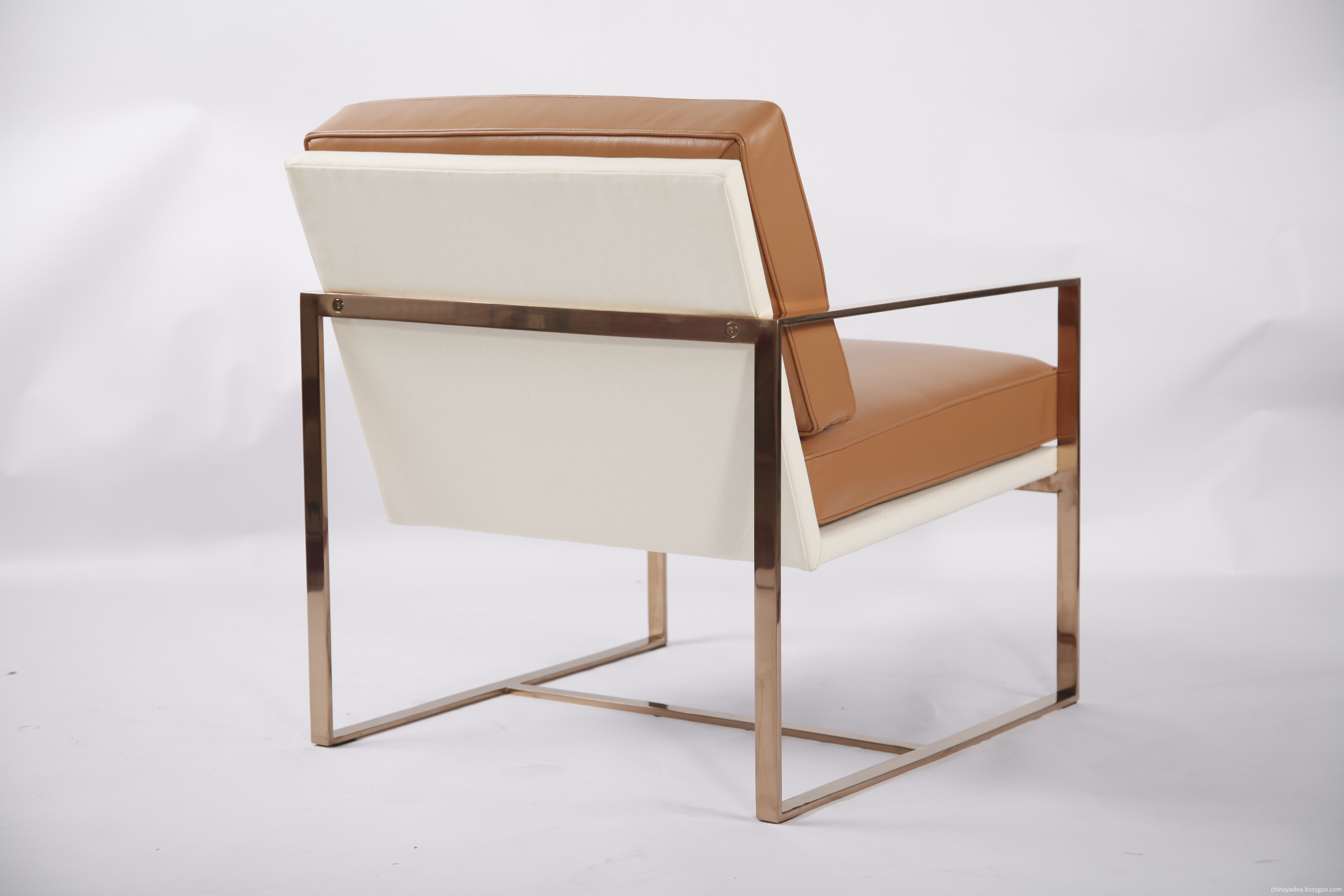 golden finished stainless steel angles chair