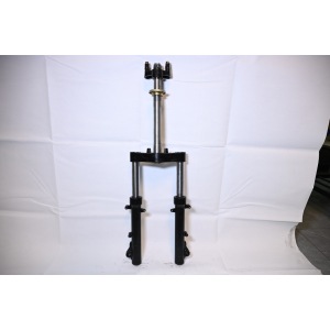 Fully enclosed side mount shock absorber