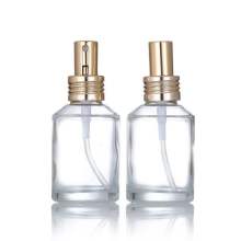 Slant glass lotion perfume bottle with pump head