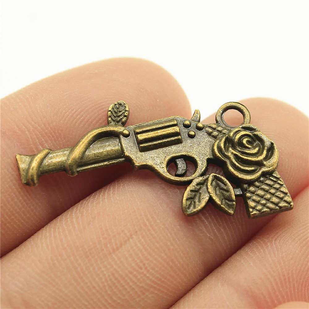 WYSIWYG 10pcs 31x19mm Antique Silver Color Antique Bronze Flower Gun Pendants Pistol Pendants Charm Flower Gun Pendants Flower