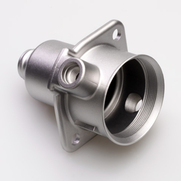 Machined threaded housing with integrated mounting flange