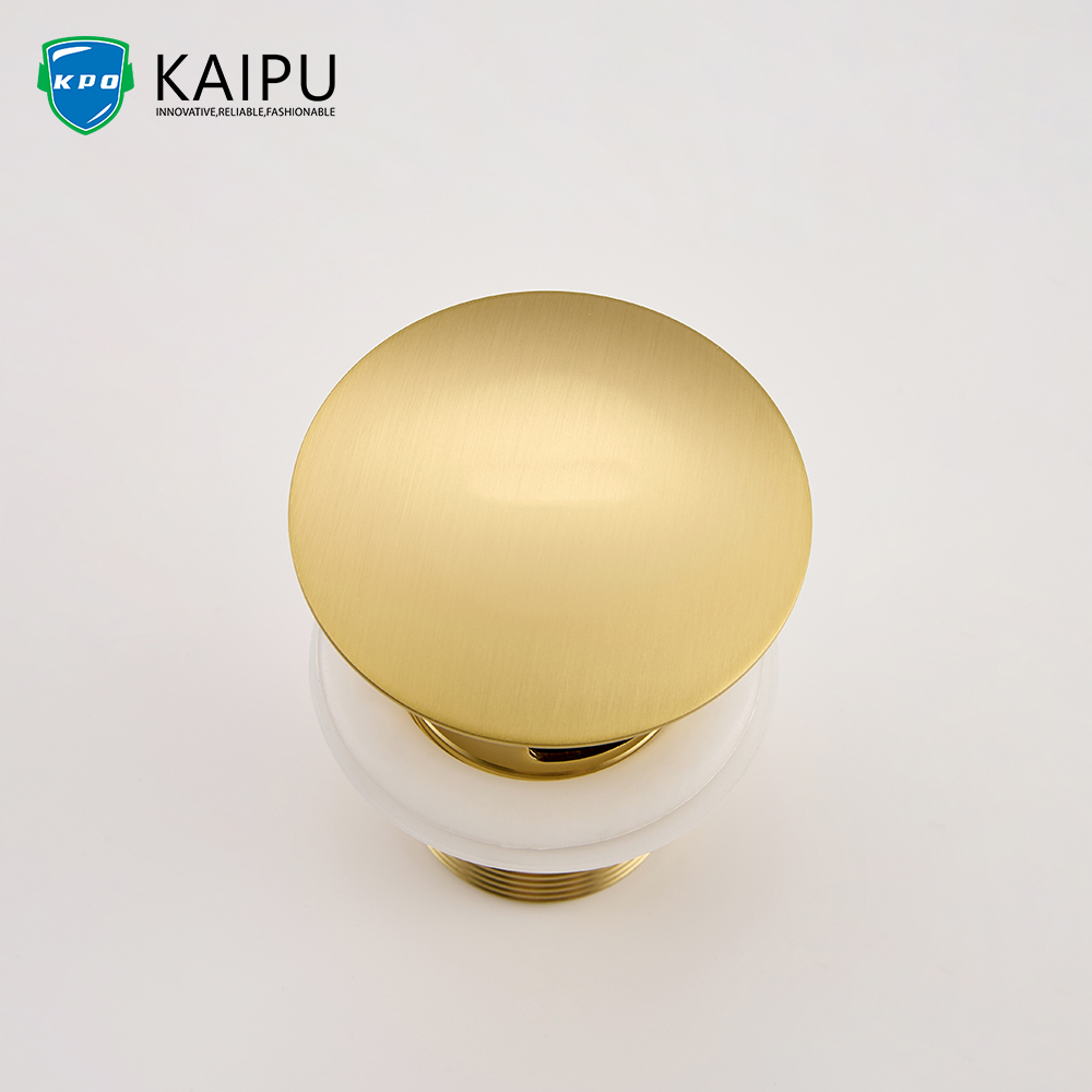 Brushed gold basin mixer with drainer (1)