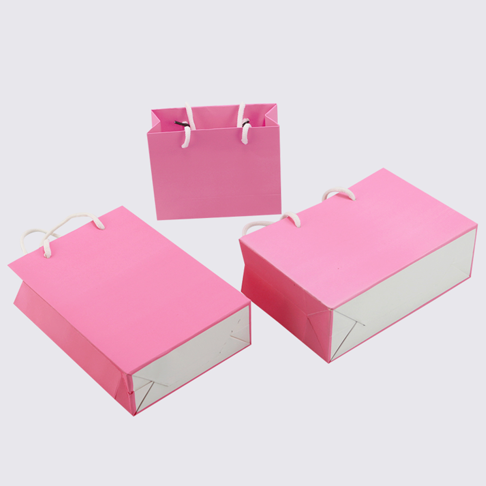 10pcs / pink paper bag holiday gift clothing gift packaging shopping bag belt support printing 1 color simple logo