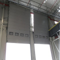 Rapid action overhead vertical sectional door