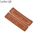 Lychee Life 50pcs PU Leather Handmade Label Sewing Garment Embossing Tags DIY Factory Wholesale Home Collection New Arrival