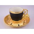 gold patterned coffee cup