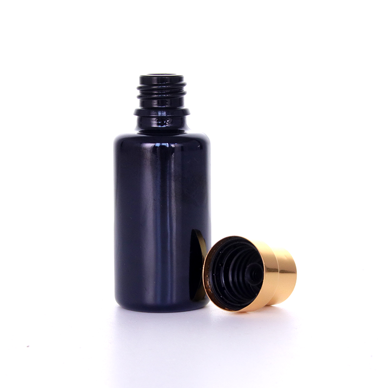 Black Round Glass Bottle With Golden Screw Caps4 Jpg