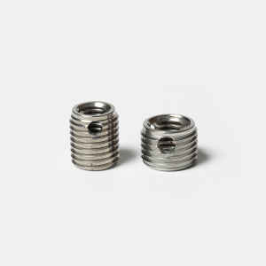 Self Tapping Insert with Cutting Bores