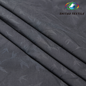 Woven‑Integrated Jacquard Down Channel Fabric
