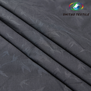 Woven‑Integrated Jacquard Down Channel Fabric