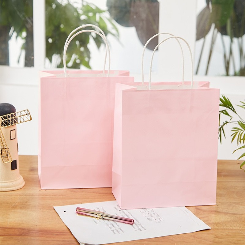Wholesale light pink kraft paper bag shopping clothing advertising gift bag green handbag supermarket shopping 10 pieces