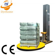 Stretch film pallet wrapping machine with weight system