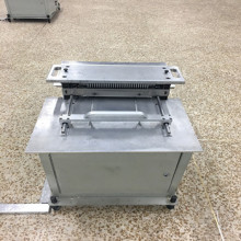 Cutting machine for rapid test uncut sheet