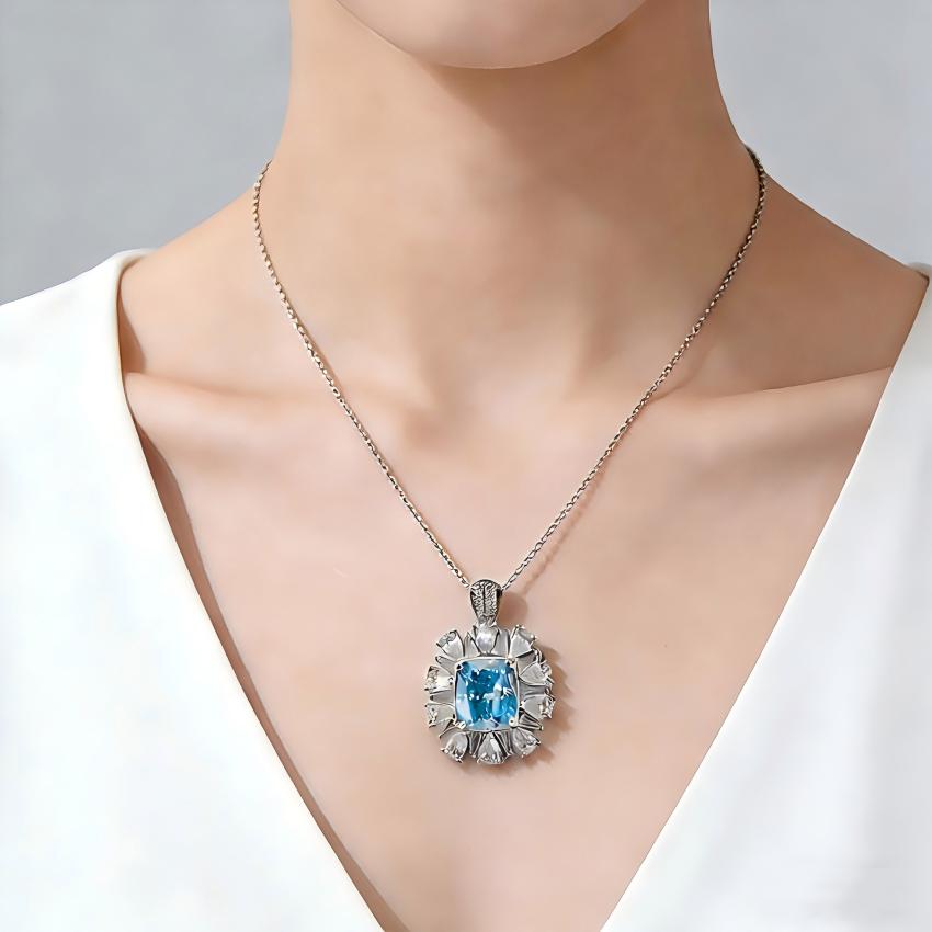 Cushion blue diamond pendant worn on necklace