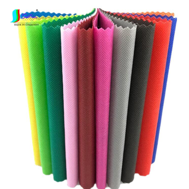 Wholesale Colorful Non-toxic Soft Polypropylene Non-woven Fabric DIY Backpack Cloth Dress Bag Dust-Proof Waterproof Fabric