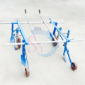 Wholesale price cheap greenhouse crop vegetable seed hand pull plastic film mulching layer machine with working width 1m/1.5m/2m