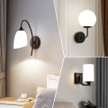 Modern iron wall lamp bedside lamp bedroom living room TV background wall lamp corridor simple black glass lampshade wall lamp