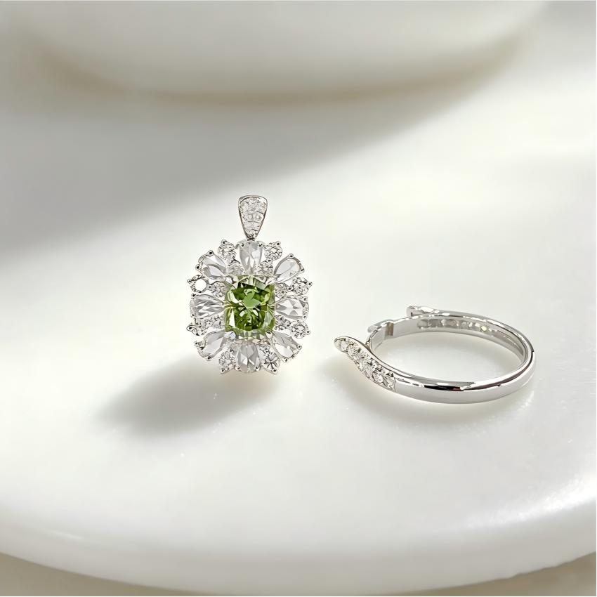 Side profile of green cushion lab diamond floral halo ring with raised detachable head