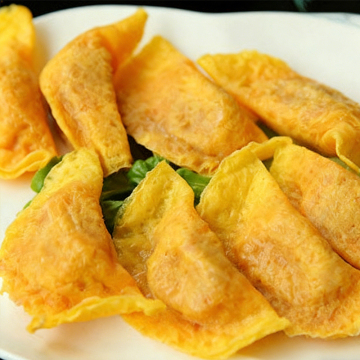 Handmade egg dumplings with chicken and pork