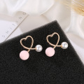 Korean version of the new creative Earrings simple, fresh cross peach heart earrings small sweet net red ear nails wholesale