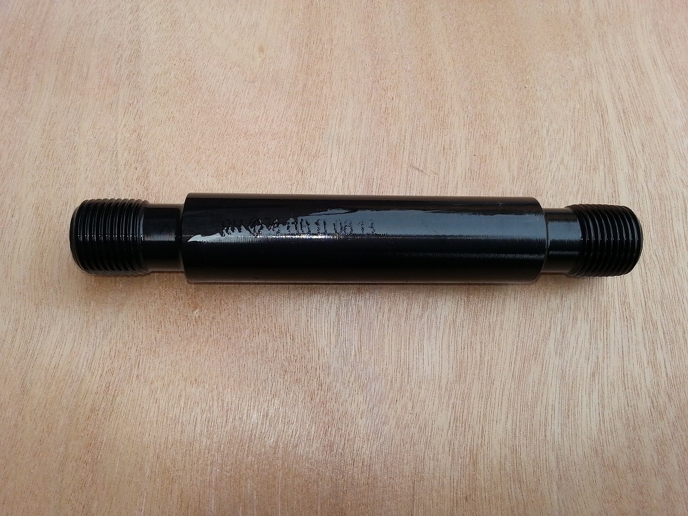 spindle for sucker rod guide