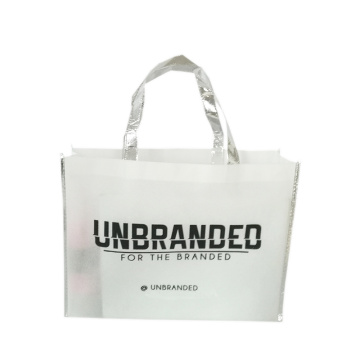 Wholesale 500pcs/lot Premium Recycled White Non Woven Bag with Silver Edges and Handle for Promotion Clothing Store Daily Use