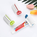 1PC Rolling Tube Toothpaste Squeezer Dispenser Toothpaste Seat Holder Stand Beauty Bathroom Supply Tooth Cleaning Accessories